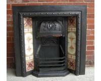 Reclaimed Arts and Crafts cast iron fireplace insert