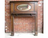 Edwardian oak fireplace surround mantel. With oval mirror